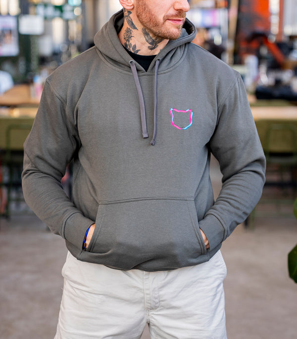 Person wearing a gray hoodie with Twisted cat logo in Twisted cat brewery