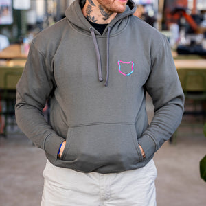 Person wearing a gray hoodie with Twisted cat logo in Twisted cat brewery